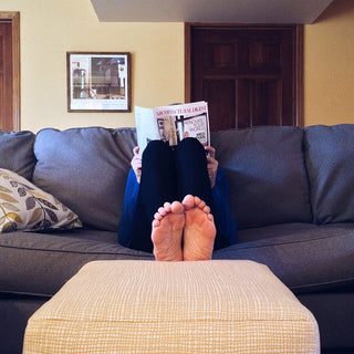 Walking barefoot at home.